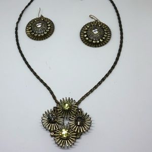 Necklace and earrings set by Anton Heunis